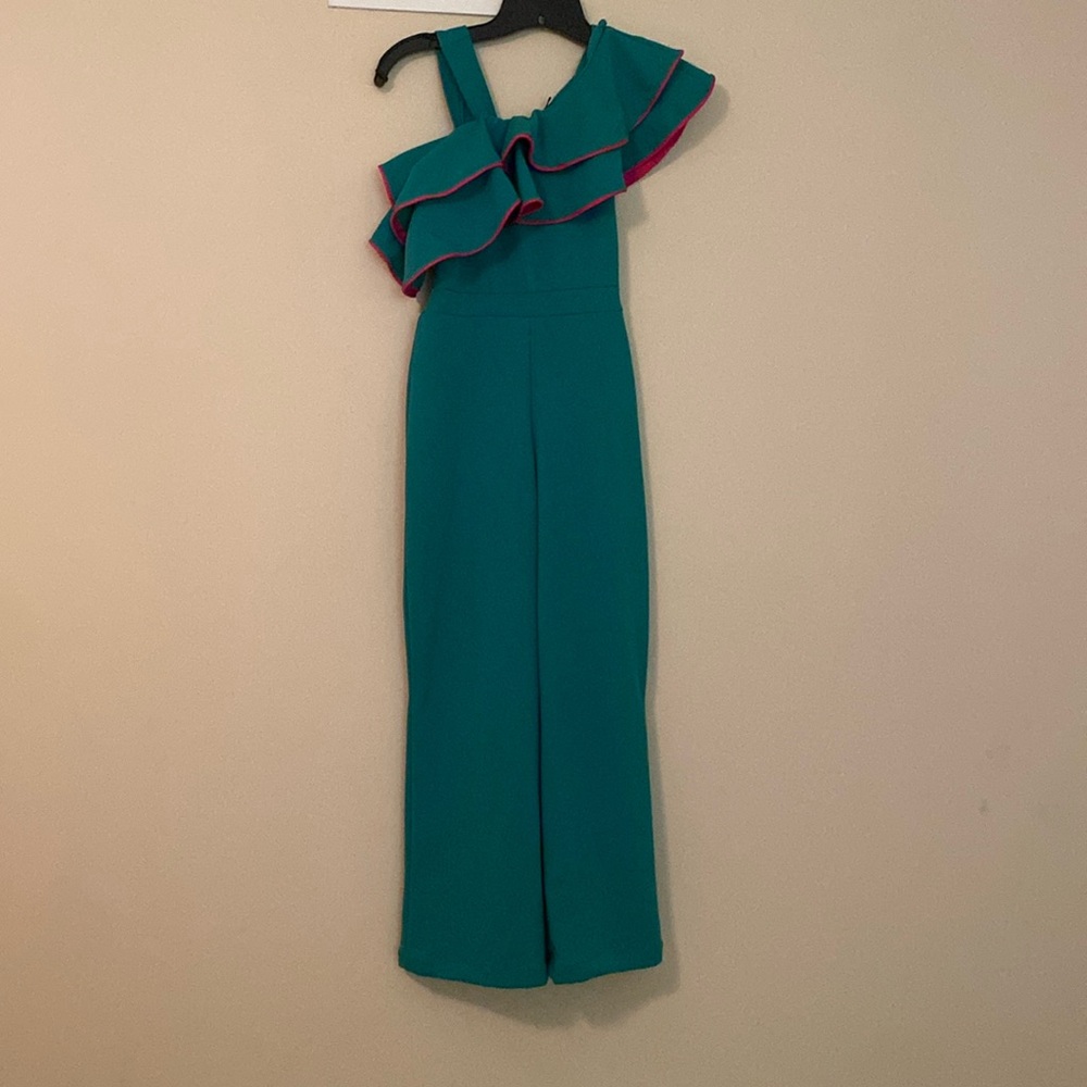 Green pantsuit with hot pink piping